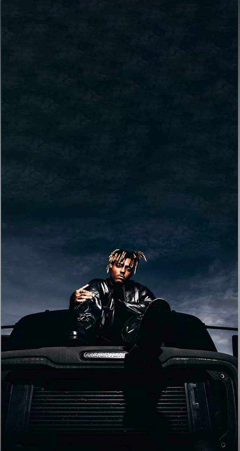 Breathtaking Cool Juice Wrld On A Vehicle’s Hood Background