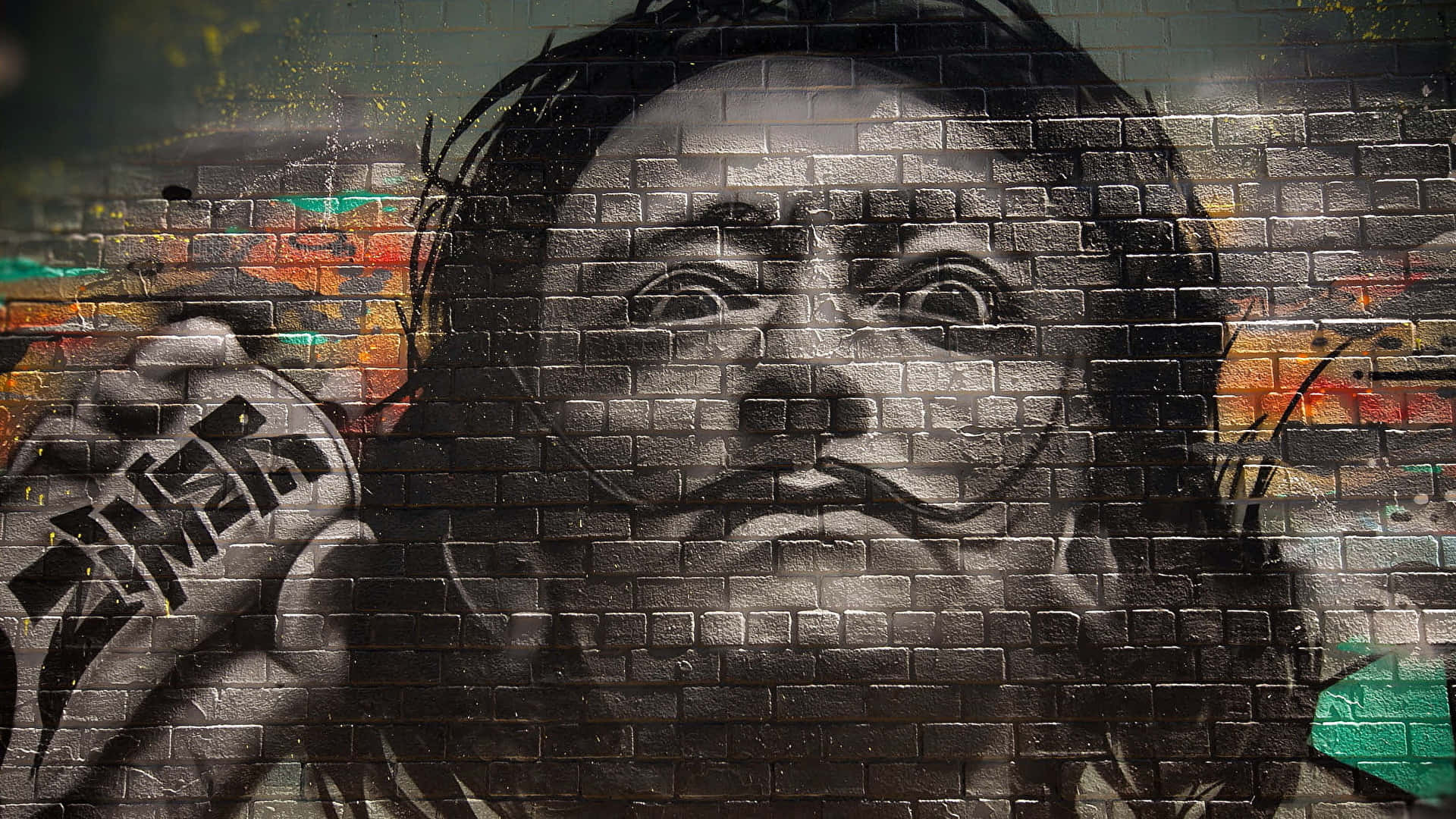 Captivating Graffiti Wall Art Of A Man With A Unique Mustache Background Image