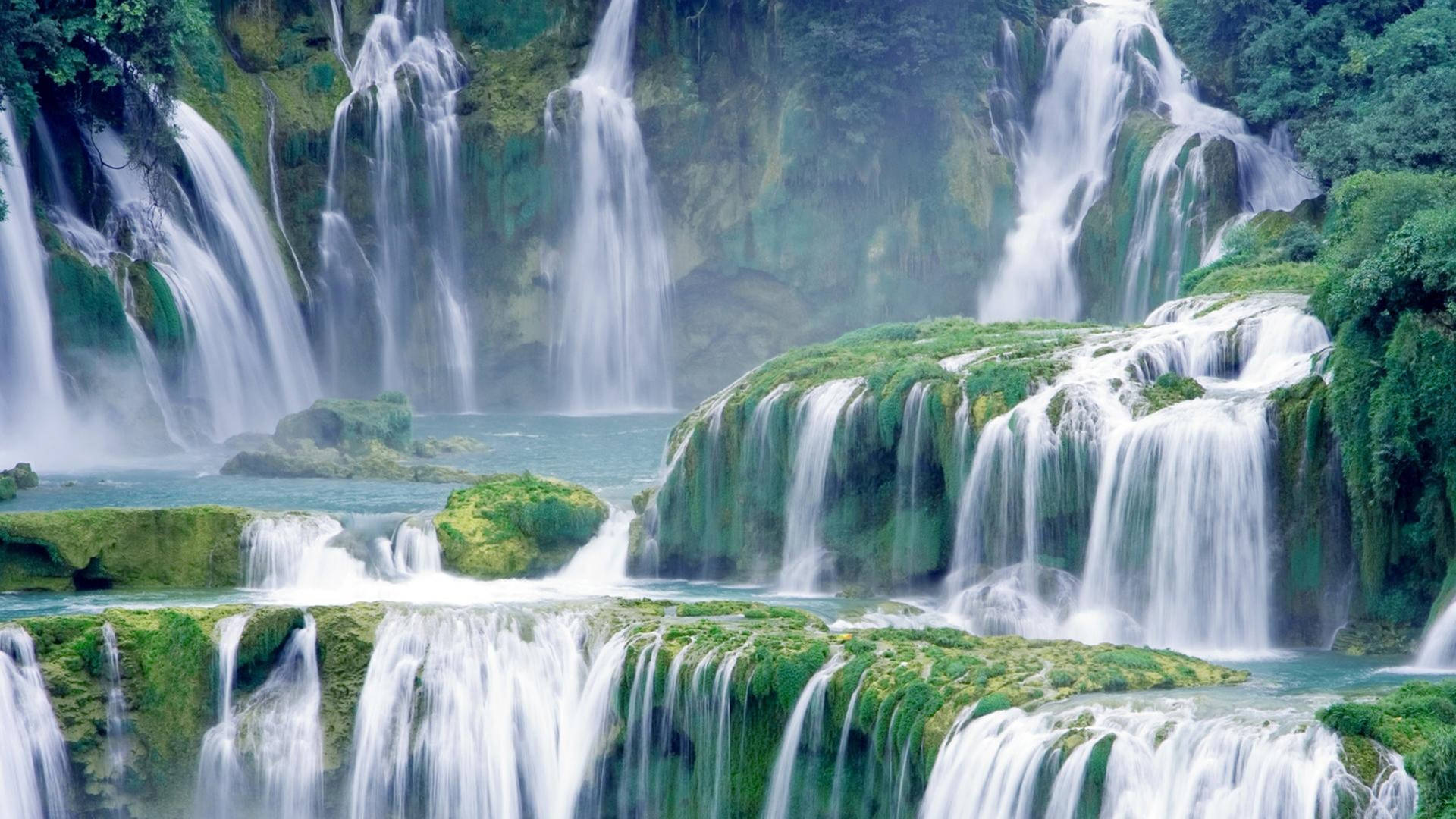 Elegant Waterfall Of Vietnam's Ban Gioc Water Falls Background Image