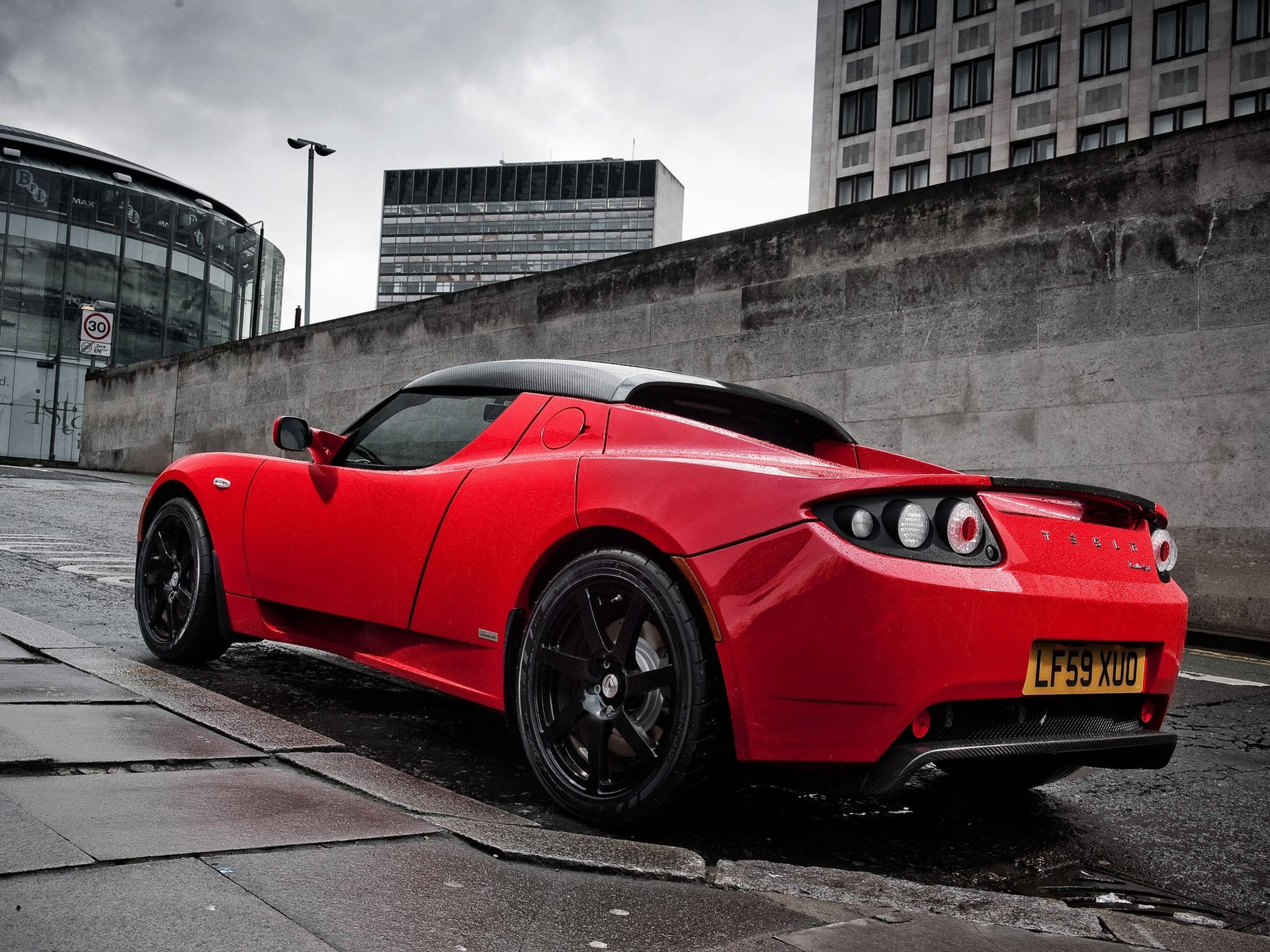 HD Tesla Roadster Rear Side View Background Image